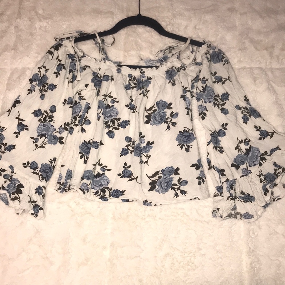 Floral bell sleeved blouse.
